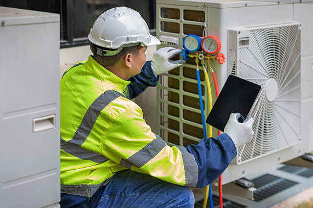 Professional Air Conditioning Repair technician working in Berne, IN